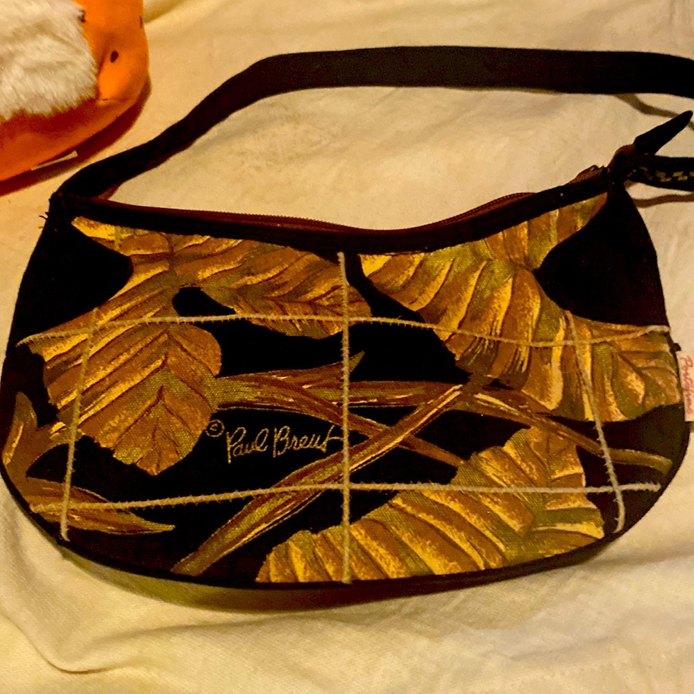 Paul Breuf   Purse medium small just right for date night in the fall.